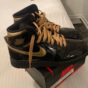 Black and gold Jordan 1